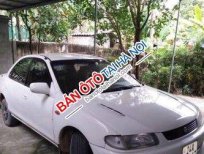 Mazda 323 MT 1998 - Tôi bán xe Mazda 323 MT đời 1998, màu trắng số sàn