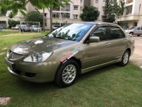 Mitsubishi Lancer Gala 2004 - Cần bán lại xe Mitsubishi Lancer Gala đời 2004, màu ghi vàng  