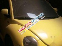 Volkswagen Beetle   2004 - Bán Volkswagen Beetle sản xuất 2004, màu vàng, nhập khẩu nguyên chiếc, giá tốt