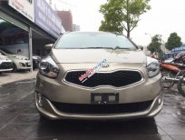 Kia Rondo GAT 2015 - Bán xe Kia Rondo GAT 2015, màu vàng cát, giá chỉ 576 triệu