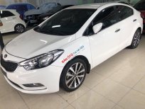 Kia K3 MT 2014 - Bán Kia K3 MT đời 2014, màu trắng chính chủ, giá chỉ 465 triệu