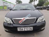 Toyota Camry  AT 2003 - Cần bán xe Toyota Camry AT đời 2003, màu đen, đk 2004