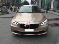 BMW 5 Series  535i GT 2012 - Bán BMW 535i GT sản xuất 2011, màu vàng cát, nội thất vàng kem, odo 3,8 vạn km