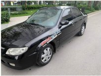Mazda 323   2004 - Cần bán xe Mazda 323 đời 2004, màu đen, xe gia đình