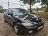 Mazda 323 2002 - Cần bán Mazda 323 đời 2002, màu đen, nhập khẩu, giá tốt