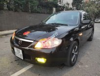 Mazda 323 2002 - Bán xe Mazda 323 năm 2002, màu đen, nhập khẩu nguyên chiếc chính chủ