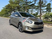 Kia Rondo   GAT  2016 - Bán ô tô Kia Rondo GAT đời 2016, màu vàng