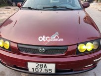 Mazda 323   GLXi 1.6 MT 2001 - Cần bán gấp Mazda 323 GLXi 1.6 MT năm 2001, màu đỏ, nhập khẩu 