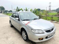 Mazda 323 2004 - Cần bán gấp Mazda 323 năm sản xuất 2004, màu bạc, xe nhập giá cạnh tranh