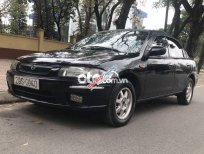 Mazda 323 1999 - Xe Mazda 323 năm 1999, màu đen