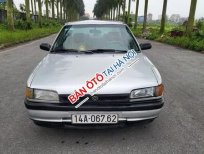 Mazda 323 1995 - Cần bán xe Mazda 323 sản xuất năm 1995, màu bạc, 39 triệu