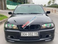 BMW 318i 2005 - Màu đen chính chủ, 186 triệu