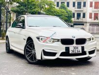 BMW 330i      2016 - Cần bán lại xe BMW 320i năm 2016, màu trắng, xe nhập, giá 955tr