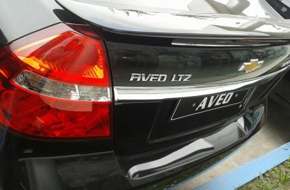 Chevrolet Aveo 1.5 LT 2016 - Cần bán Chevrolet Aveo LT 2016, màu đen, giá chỉ 452 triệu