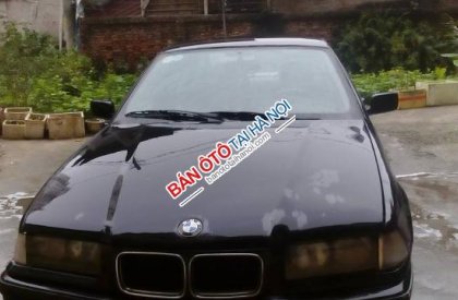 BMW 3 Series  320i 1997 - Cần bán BMW 320i đời 1997, màu đen, nhập khẩu
