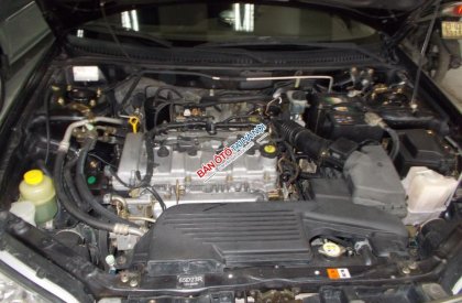 Ford Laser Ghia 1.8   2003 - Bán Ford Laser Ghia 1.8 đời 2003, màu đen  