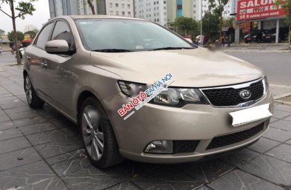 Kia Forte 2011 - Bán ô tô Kia Forte đời 2011, màu kem (be)