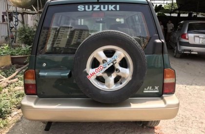 Suzuki Vitara 4x4MT 2005 - Cần bán xe Suzuki Vitara MT 4x4 đời 2005, màu xanh lam như mới