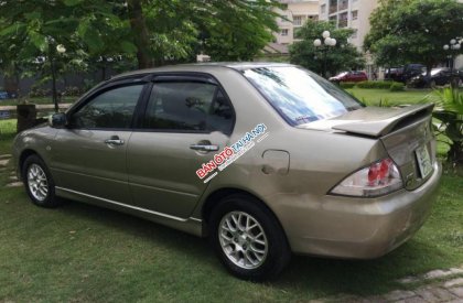 Mitsubishi Lancer Gala 2004 - Cần bán lại xe Mitsubishi Lancer Gala đời 2004, màu ghi vàng  