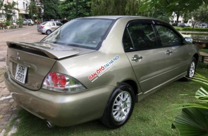 Mitsubishi Lancer Gala 2004 - Cần bán lại xe Mitsubishi Lancer Gala đời 2004, màu ghi vàng  