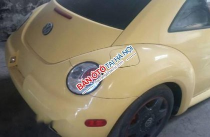 Volkswagen Beetle   2004 - Bán Volkswagen Beetle sản xuất 2004, màu vàng, nhập khẩu nguyên chiếc, giá tốt