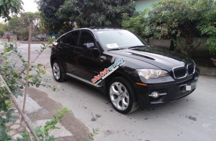 BMW X6 xDriver35i 2011 - Bán ô tô BMW X6 xDriver35i đời 2011, màu đen, xe nhập chính chủ