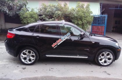 BMW X6 xDriver35i 2011 - Bán ô tô BMW X6 xDriver35i đời 2011, màu đen, xe nhập chính chủ