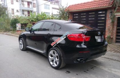 BMW X6 xDriver35i 2011 - Bán ô tô BMW X6 xDriver35i đời 2011, màu đen, xe nhập chính chủ