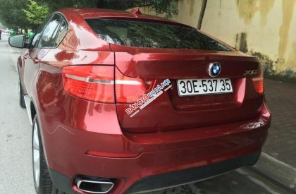 BMW X6 xDriver35i 2009 - Bán BMW X6 xDriver35i đời 2009, màu đỏ, xe nhập chính chủ, giá chỉ 930 triệu