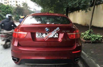 BMW X6 xDriver35i 2009 - Bán BMW X6 xDriver35i đời 2009, màu đỏ, xe nhập chính chủ, giá chỉ 930 triệu