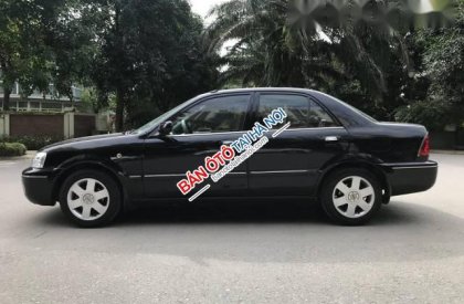 Ford Laser   MT 2004 - Cần bán Ford Laser MT đời 2004, màu đen chính chủ, giá chỉ 195 triệu