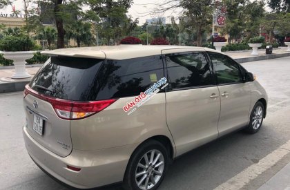 Toyota Previa 2.4 2009 - Toyota Previa 2.4 model 2010, màu vàng, xe nhập, cần bán 899 triệu