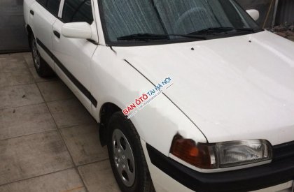 Mazda 323 MT 1995 - Bán xe Mazda 323 MT đời 1995, màu trắng, xe nhập 