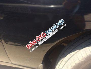 Daewoo Lanos 2001 - Cần bán gấp Daewoo Lanos năm sản xuất 2001, màu đen