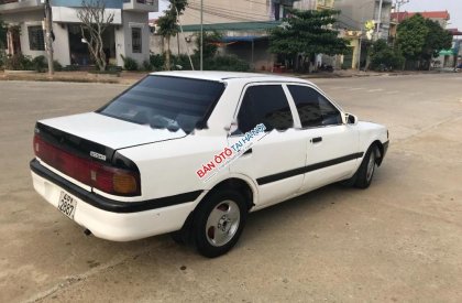 Cần bán gấp Mazda 323 đời 1995, màu trắng, nhập khẩu giá cạnh tranh