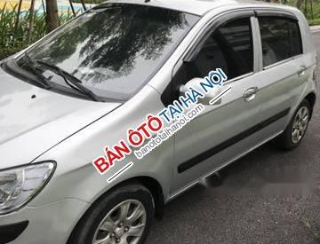 Hyundai Getz 1.1 2010 - Bán Hyundai Getz 1.1 năm 2010, màu bạc số sàn, phiên bản đủ