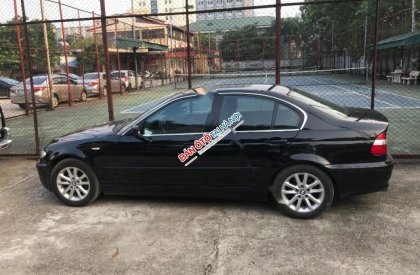 BMW 3 Series 318i 2005 - Cần bán BMW 3 Series 318i đời 2005, màu đen chính chủ