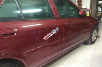 Ford Laser 1.6 2002 - Gia đình bán Ford Laser 1.6 đời 2002, màu đỏ  