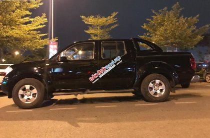 Nissan Navara LE 2013 - Cần bán Nissan Navara LE đời 2013, màu đen chính chủ, 415 triệu