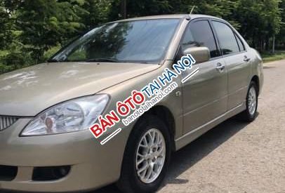 Mitsubishi Lancer 2004 - Cần bán xe Mitsubishi Lancer đời 2004, màu vàng 