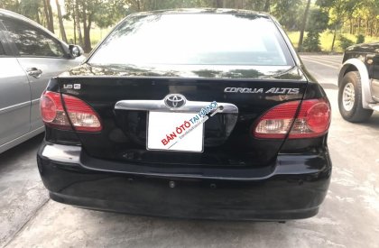 Toyota Corolla altis  1.8G  2005 - Cần bán xe Toyota Corolla Altis G đời 2005, màu đen, hàng tuyển