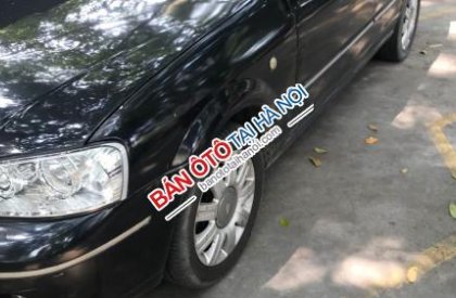 Ford Laser   MT  2004 - Xe Ford Laser MT sản xuất năm 2004, màu đen, giá tốt