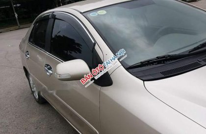 Toyota Vios E 2012 - Bán Toyota Vios E sản xuất 2012, màu vàng