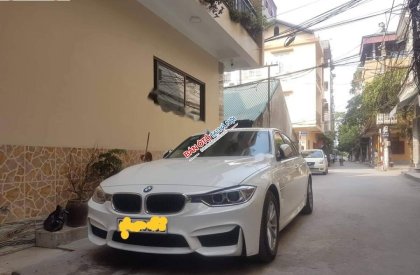 BMW 3 Series 320i  2013 - Cần bán gấp BMW 3 Series 320i đời 2013, màu trắng, xe nhập, giá chỉ 790 triệu