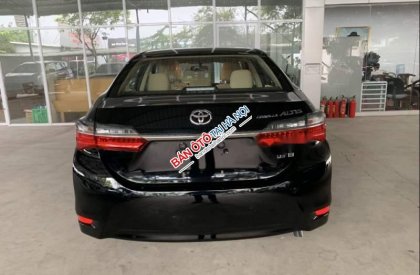 Toyota Corolla altis   1.8E 2019 - Cần bán xe Toyota Corolla altis đời 2019, màu đen, mới 100%