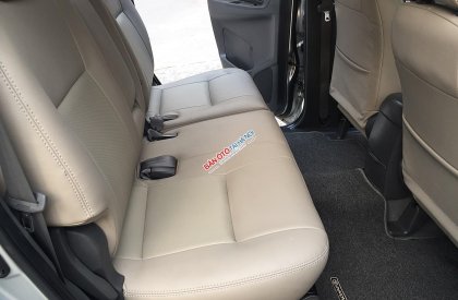 Toyota Innova E 2013 - Cần bán xe Toyota Innova E năm sản xuất 2013, màu bạc