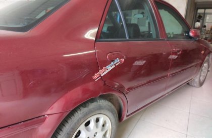 Ford Laser 2002 - Bán Ford Laser năm 2002, màu đỏ xe gia đình, 170 triệu
