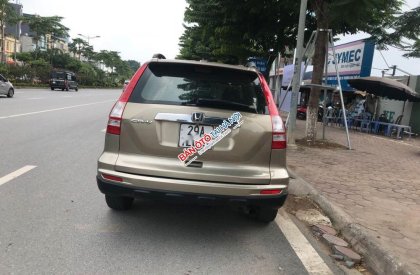 Honda CR V 2.4AT 2011 - Cần bán Honda CR V 2.4AT sản xuất năm 2011, màu vàng