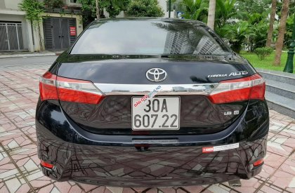 Toyota Corolla altis 1.8G 2015 - Bán Toyota Corolla altis 1.8G đời 2015, màu đen