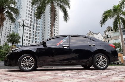Toyota Corolla altis 1.8G 2015 - Bán Toyota Corolla altis 1.8G đời 2015, màu đen